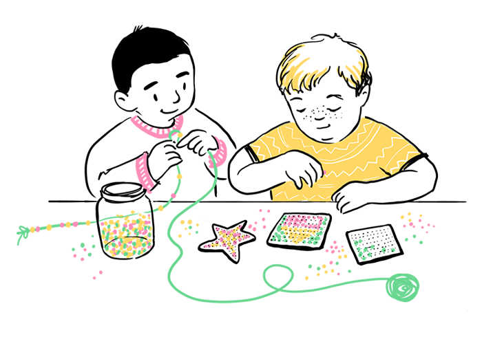 Boys playing with fuse (Perler) beads