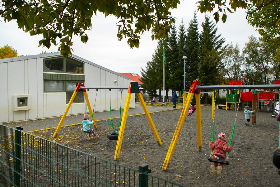 Children playing on the grounds of Hálsaskógur.