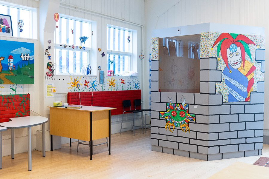 Corner at the Frostheimar after-school program with cheerfully painted walls.