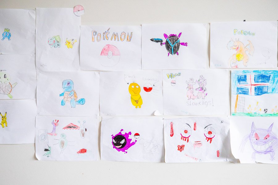 Children's artwork displayed on the wall at Vogasel after-school program