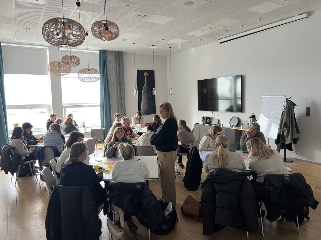 Photo of experts in discussion at a workshop